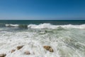 Water flowing and waves in the Mediterranean sea and blue sky at the Tel Aviv port, Israel Royalty Free Stock Photo