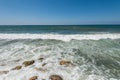 Water flowing and waves in the Mediterranean sea and blue sky at the Tel Aviv port, Israel Royalty Free Stock Photo