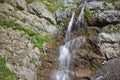 Water flows down from the mountains Royalty Free Stock Photo