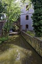 Water flows from the man-made waterfall