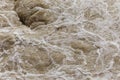 Water foam texture, rough water on the river, natural background, flood, power in nature concept. Rough water, furious current on Royalty Free Stock Photo
