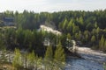 Water of forest waterfall of river crashes on the rocks in summer Royalty Free Stock Photo