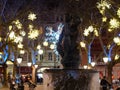 Water fountain and Christmas lights at Sloan Square, London, UK