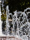 Water fountain - closeup shot on water flows and droplets