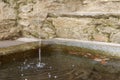 Water Fountain Flowing Into A Stone Tank