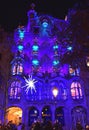 Water fountain and illuminated building in Barcelona