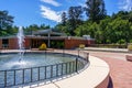 Water fountain in Los Gatos Civic Center; the Town Hall building visible in the background; south San Francisco bay area, Royalty Free Stock Photo