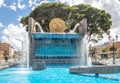 Water fountain monument with Golden Inca Sun Disc in the streets of Cusco City - Cusco, Peru Royalty Free Stock Photo