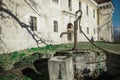 Water fountain or pump at an older romanic castle at Krumperk, close to Krtina or Domzale in Slovenia on a sunny day