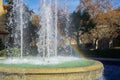 Water fountain with rainbow Royalty Free Stock Photo