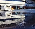 Water fountain reflection with vacation caravan and window architecture during the afteroon