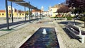 Water fountains and public recreation space, in a cobblestone Square of the Republic in the town center, Nisa, Portugal