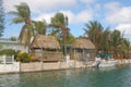 Water front Tiki Huts Royalty Free Stock Photo
