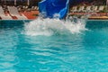 Water fun in the pool, slide. Concept, cheerful, perky bright colorful summer and relaxation. View from above Royalty Free Stock Photo