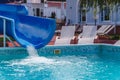 Water fun in the pool, slide. Concept, cheerful, perky bright colorful summer and relaxation. View from above Royalty Free Stock Photo