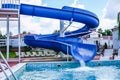 Water fun in the pool, slide. Concept, cheerful, perky bright colorful summer and relaxation. View from above Royalty Free Stock Photo