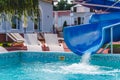 Water fun in the pool, slide. Concept, cheerful, perky bright colorful summer and relaxation. View from above Royalty Free Stock Photo