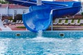 Water fun in the pool, slide. Concept, cheerful, perky bright colorful summer and relaxation. View from above Royalty Free Stock Photo