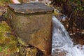 Water gatherer in mountains, Italy