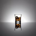 Water in glass with ice cubes on isolated background Royalty Free Stock Photo