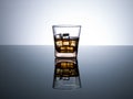 Water in glass with ice cubes on isolated background Royalty Free Stock Photo