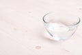 Water in a glass and a napkin on the board Royalty Free Stock Photo