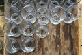 Water glasses in a wooden crate. Royalty Free Stock Photo