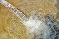 Water gushing out of the pipe close up Royalty Free Stock Photo