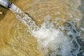 Water gushing out of the pipe close up Royalty Free Stock Photo