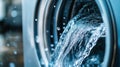 Water gushing from a washing machine drum Royalty Free Stock Photo