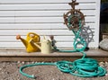 Water hose and watering cans