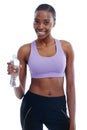 Water - an important part of my workout. An isolated portrait of a sporty young woman holding a bottle of water. Royalty Free Stock Photo