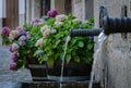 Water jet in a fountain on the streets of a village Royalty Free Stock Photo