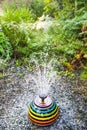 Water Jets in Multi-colored Ceramic Vases in Green Martels Garden Royalty Free Stock Photo