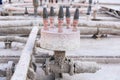 Water jets from a public fountain in repairs Royalty Free Stock Photo