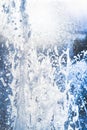 Water jets and a spray of a fountain close up Royalty Free Stock Photo