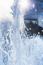 Water jets and a spray of a fountain close up Royalty Free Stock Photo