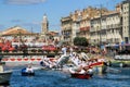 Water Jousting performance during St.Louis festival at the streets of Sete, South of France Royalty Free Stock Photo