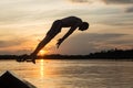 Water Jump Against Sunset