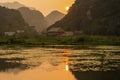 Water lake and big mountain background on the sunset in Ninh Binh province, Vietnam