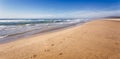 Very long sandy beach and shore line Royalty Free Stock Photo