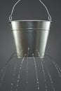 Water leaking from bucket Royalty Free Stock Photo