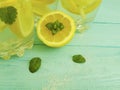 Water soda lemon tropical organic refreshment , freshness homemade health mint summer on a blue wooden background Royalty Free Stock Photo