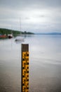 Water level measurement pole at lake Ammersee Bavaria Royalty Free Stock Photo