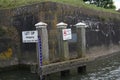 Water level meter and entrance to the harbor in the Netherlands.