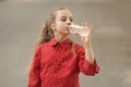 Water is life. Thirsty child drinking fresh water from plastic bottle. Little girl having a drink from water bottle Royalty Free Stock Photo