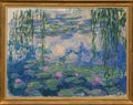 Water lilies, Nympheas, with weeping willow, by French impressionist painter Claude Monet