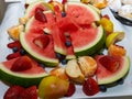 water melon fruit bowl strawberries wild berries and mandarin fruits creating nice colourful food platter