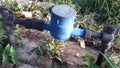 Water meter,black pipe on concrete floor. Royalty Free Stock Photo