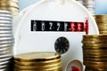 Water meter and money. Payment for utilities. Royalty Free Stock Photo